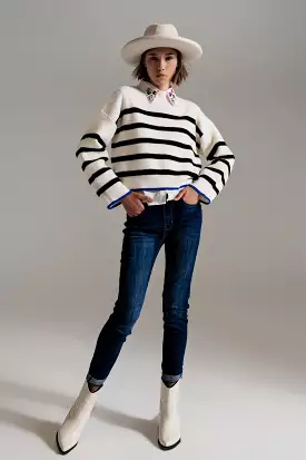 Black Striped Jumper with Blue Stripe Detail on the Bottom