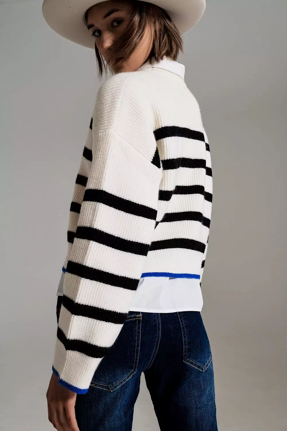 Black Striped Jumper with Blue Stripe Detail on the Bottom