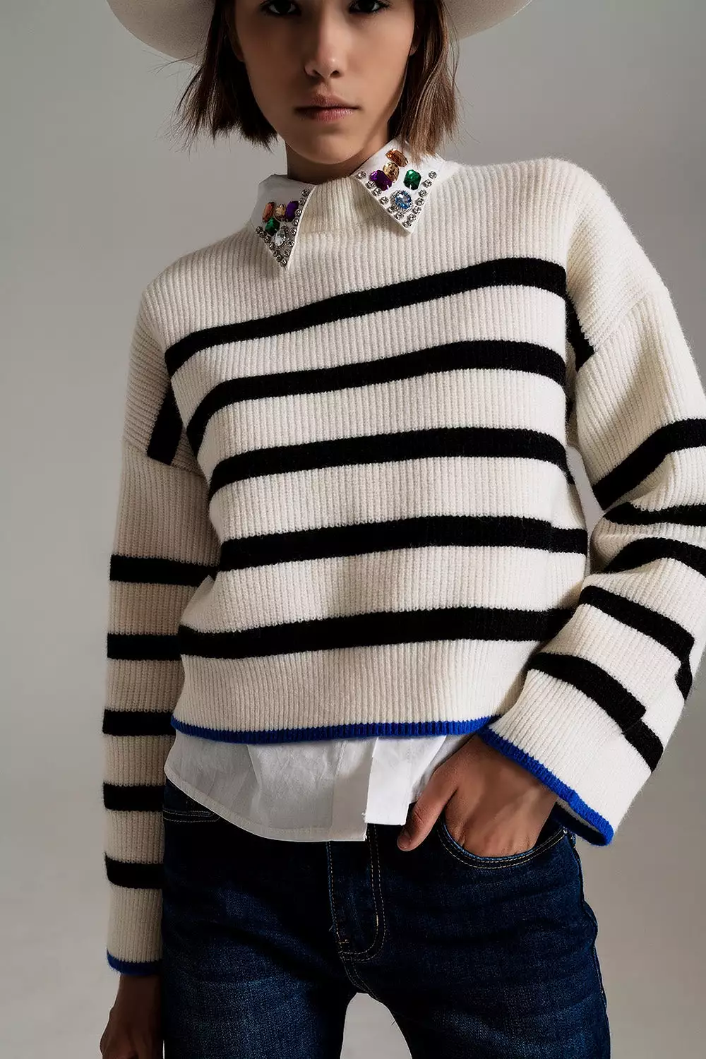 Black Striped Jumper with Blue Stripe Detail on the Bottom