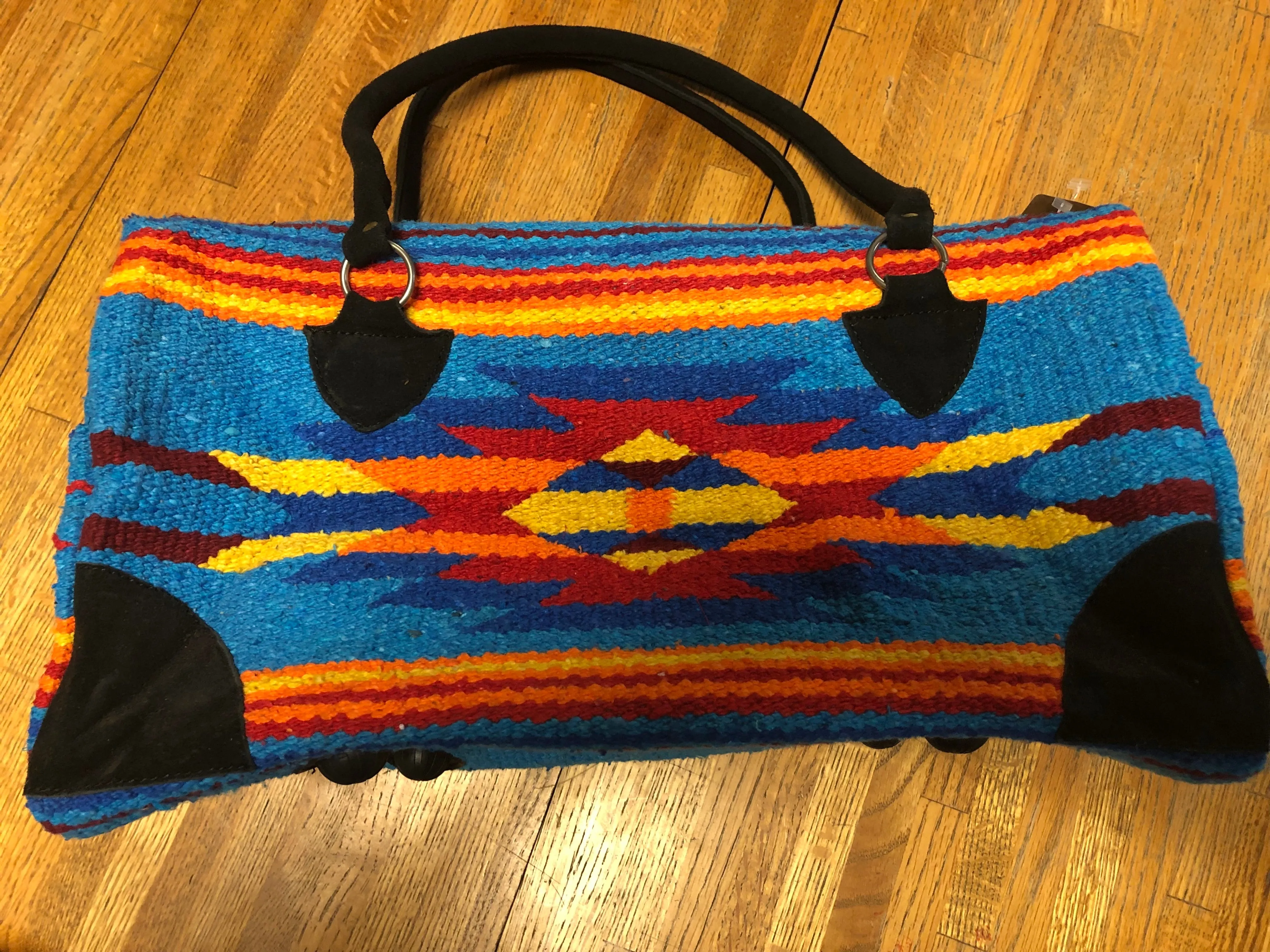 Handwoven Recycled Acrylic weekender bag.  18” x 8” wide, 8” tall.