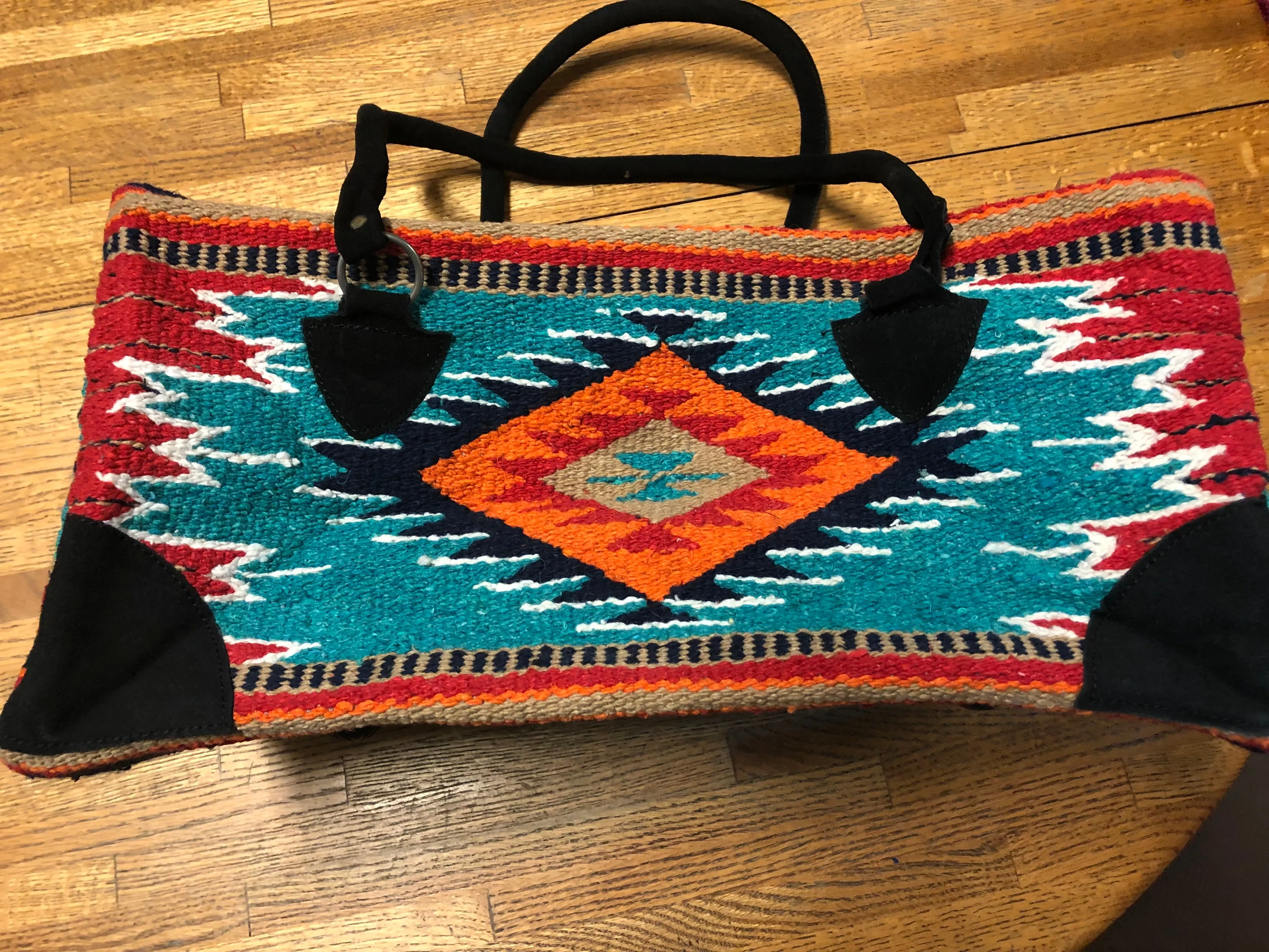 Handwoven Recycled Acrylic weekender bag.  18” x 8” wide, 8” tall.